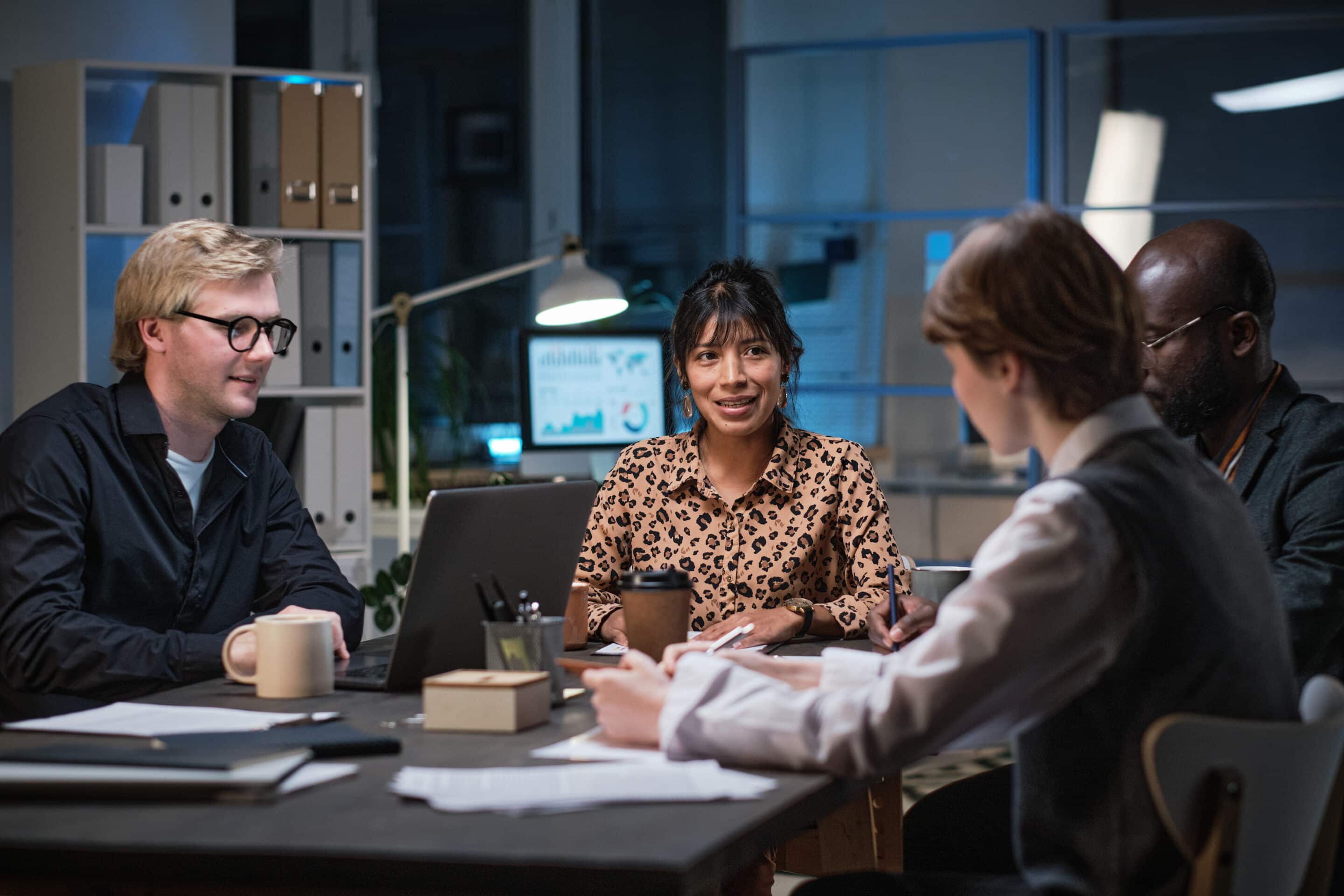 business people sitting at meeting till late eveni 2025 02 11 15 42 21 utc scaled 2